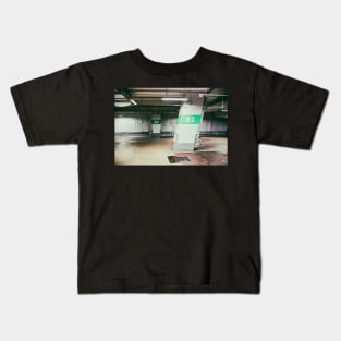 Parking garage underground, industrial interior Kids T-Shirt